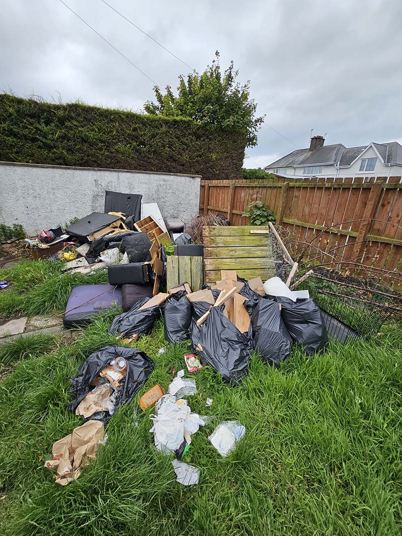 Old furniture, wood and waste ready for collection